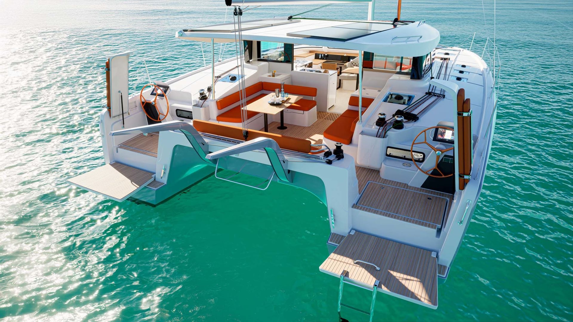 Catamaran de croisière au mouillage sur une eau turquoise, vu depuis l'arrière Catamaran de croisière au mouillage sur une eau turquoise, vu depuis l'arrière